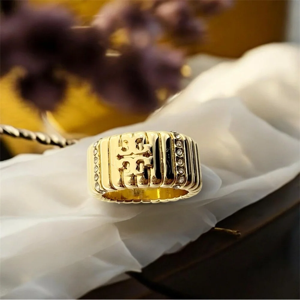 Tory Burch Crystal Textured Pave Logo Band Ring. Size 8